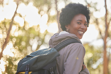 Image showing Black woman, portrait and hiking for fitness outdoors in nature for morning workout, training and happy for wellness. Travel, health and exercise by hiker or female athlete in the natural environment