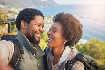 Image showing Love, nature and selfie, couple hiking on mountain for fitness, fun and romantic walk in natural landscape. Romance, hiker man and black woman talking self portrait with smile in mountains on island.