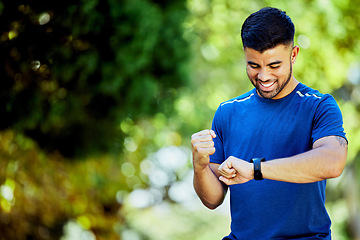 Image showing Fitness, mockup and watch with a man cheering his progress as a runner on a cardio or endurance workout. Exercise, running and health with a male athlete celebrating a target or goal while training