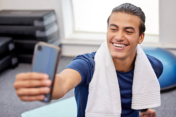 Image showing Fitness, man and smile for selfie, social media or profile picture with towel after workout exercise or training at the gym. Happy sporty male vlogger or influencer smiling in happiness for vlog post