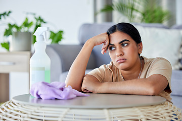 Image showing Cleaning, tired and bored with a woman in the living room of her home for hygiene or housework.Depression, burnout and housekeeping with a frustrated female cleaner in an apartment domestic work