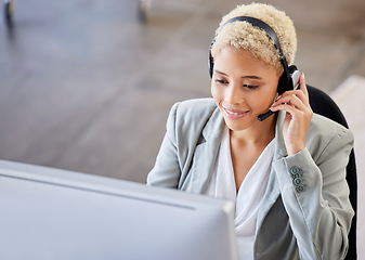 Image showing Top view, call center and black woman in office, customer support for telemarketing, help or consulting. African American female agent, lady or consultant with headset, advice or talking in workplace