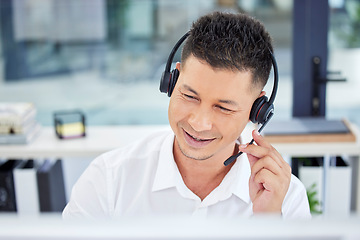 Image showing Call center, contact us and customer service worker consulting or working telemarketing in the office. CRM, help and happy male agent, consultant or employee smiling on a call using a headset