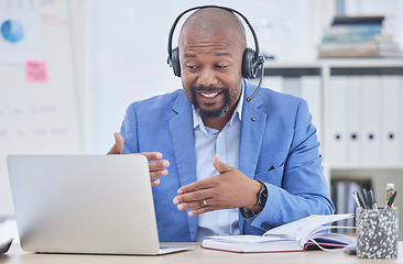 Image showing Black man, laptop and consulting on video call for telemarketing, meeting or business idea at the office. African American male consultant in communication on computer for strategy or project plan