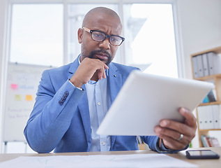 Image showing Black man, tablet and serious thinking face in office for web design, online communication or reading tech email in office. African businessman, digital search or boss planning strategy on device