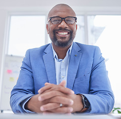 Image showing Businessman, CEO and portrait smile for management, leadership or corporate executive sitting by office desk. Happy African American male manager smiling for entrepreneurship, sales or investment