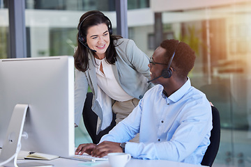 Image showing Call center, customer service and a manager talking to a black man consultant in their telemarketing office. Ecommerce, contact us and training with a female supervisor coaching a male sales employee