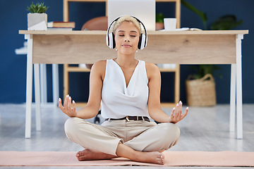 Image showing Music, meditation and yoga with a business black woman finding inner peace or zen in her office. Headphones, mental health and balance with a calm female eployee meditating at work for wellness