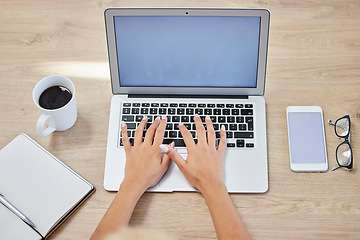 Image showing Hands, laptop and typing on mockup screen for digital marketing, branding or advertising on wooden desk. Hand of event planner, blogger or designer above on computer for social media or advertisement