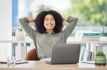 Image showing Black woman, laptop and smile in relax by office desk for job done, tasks or work break at a workplace. African American female employee designer smiling and relaxing or stretching by computer table