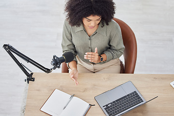 Image showing Microphone communication, laptop and black woman streaming podcast, radio talk show or speaker giving trading advice. Online broadcast, live streaming video call and top view of business influencer