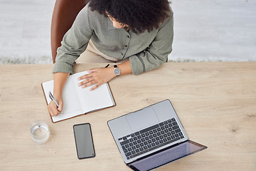 Image showing Laptop, writing and notebook with a business black woman at work on a schedule in her office from above. Computer, research and overhead with a female employee planning while working at a desk