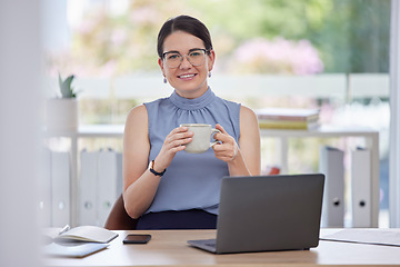 Image showing Portrait, coffee and laptop with a business woman taking a break while working on a report in her office. Computer, tea and relax with a female employee drinking a beverage while sitting at work