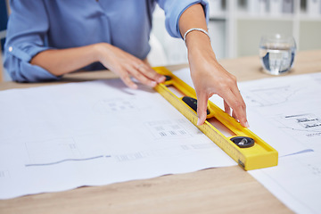 Image showing Architect, woman and blueprint with hands of an engineer drawing plan on paper for property development. Designer at her office desk for project management, building architecture and engineering