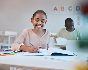 Image showing Education, smile and child in classroom learning reading, writing and math in Montessori school in New York. Books, students and happy girl at kid desk in class with notebook studying for future exam