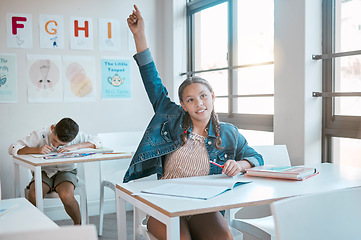 Image showing Education, black girl in class and question with hand in air, studying and learning for knowledge, answer or excited. African American female, young kid or child with arm raised for asking and growth