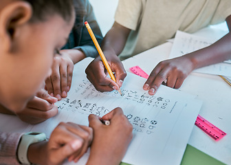 Image showing School, children and hands writing for teamwork with learning activity in classroom group together. Young kids and students working on literacy and academic exercises for development at desk.