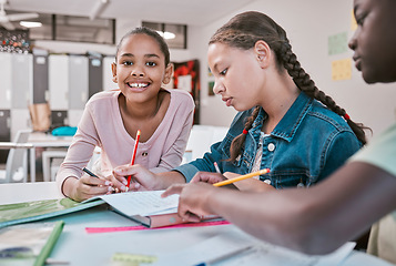 Image showing Education, students and portrait of girl in classroom with friends working together on project in Montessori school. Books, help and diversity, children writing or drawing in notebook for homework.