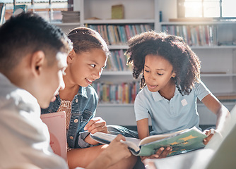 Image showing Education, storytelling or students reading in a library for group learning development or growth. Diversity, kids or children talking or speaking together for feedback on fun fantasy books at school