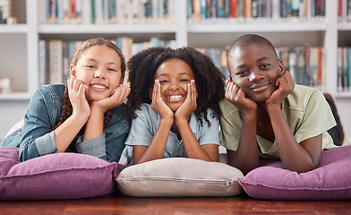 Image showing Children in library, portrait with learning and education, happy with books and academic growth. Knowledge, information and development with young students, happiness to learn and school activity