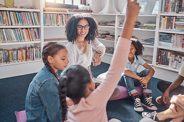 Image showing Raise hand, education and teacher with children in a classroom for learning or child development. Question, academic and black woman tutor teaching smart young kid students or learners at an academy.