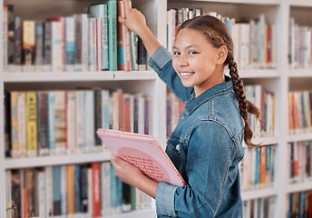 Image showing Books, happy or girl in a library to search for knowledge or development for learning growth. High school, portrait or scholarship student searching, studying or reaching for education or information