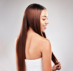 Image showing Hair, beauty and back of woman in studio for grooming, healthy hair and salon treatment on grey background. Profile, haircare and happy girl model relax for luxury, keratin and shiny results isolated