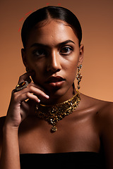 Image showing Fashion, jewellery and portrait of woman in studio for designer, luxury cosmetics and accessories. Beauty, aesthetic and face of Latina girl with elegant, vintage and classy style on brown background