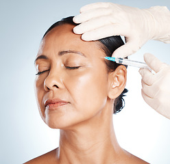 Image showing Needle, woman face and plastic surgery for medical skincare, collagen or beauty. Botox cosmetics, facial injection and aesthetic filler for body transformation, change and makeup on studio background