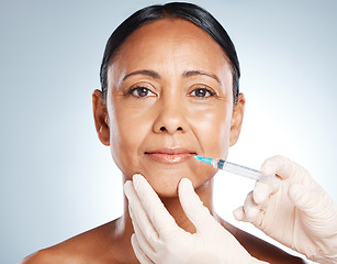 Image showing Injection, lip filler and portrait of woman face for plastic surgery, cosmetics and beauty implant. Skincare, facial syringe and botox aesthetic for liposuction, transformation and studio background