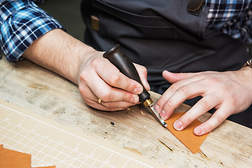 Image showing Concept of handmade craft production of leather goods.