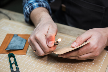 Image showing Concept of handmade craft production of leather goods.