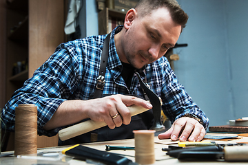 Image showing Concept of handmade craft production of leather goods.