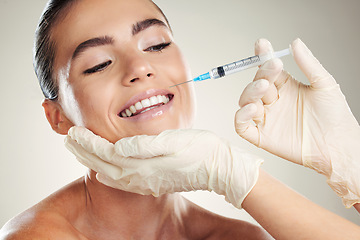 Image showing Smile, beauty and woman with injection in lips from healthcare professional, anti aging wrinkle treatment in studio. Collagen, skincare and model with facial lip filler syringe on white background