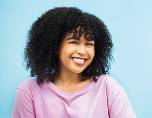 Image showing Smile, beauty and portrait of black woman on blue background with makeup, cosmetics and fashion mockup. Happiness, advertising and face of girl with positive mindset, happy attitude and freedom