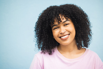 Image showing Smile, fashion and portrait of black woman on blue background with makeup, cosmetics and retail mockup. Beauty, advertising and happy face of girl with copy space for sale, promotion and discount