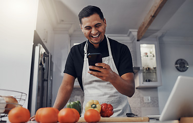 Image showing Man, cooking vegetables and phone for comic online recipe in kitchen with house wifi connection. Chef person with mobile app for learning or blog post for home food for vegan or healthy eating