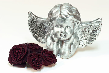 Image showing Silver cupid with roses