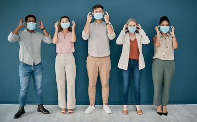 Image showing Covid, portrait and group of business people in office for health and safety. Teamwork, compliance and employees, men and women with face mask or ppe to stop corona virus for wellness in workplace.