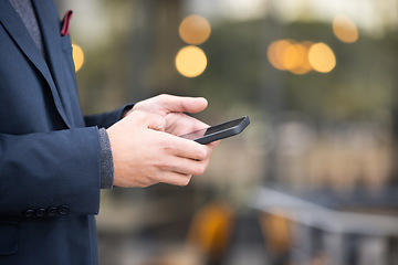 Image showing Hands, travel or business man with phone for networking, social media or communication in London street. Search, zoom or manager with smartphone for research, internet or blog content review outdoor