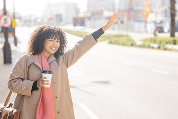 Image showing Taxi, coffee and commuting with a business black woman calling or hailing a cab outdoor in the city. Street, travel and transport with a female using ride share to commute in an urban town