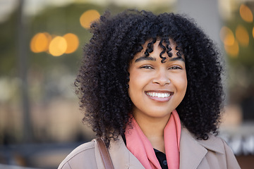Image showing Happy woman, portrait and city travel with a smile while outdoor on London street with freedom. Face of young black person with natural afro hair, beauty and fashion style during student holiday walk