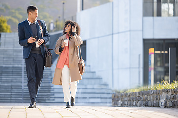 Image showing Businessman, black woman and walking with coffee in city for planning, strategy or social discussion by office building. Teamwork, finance job and friends with discussion in urban metro for success