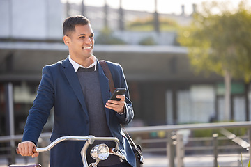 Image showing Phone, bicycle and commute with a business man in the city using eco friendly transport for work travel. Mobile, bike and 5g mobile technology with a male employee thinking about his carbon footprint