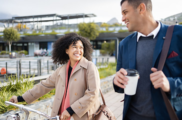 Image showing Bicycle, travel and happy business people walking in urban city, communication and team conversation. Worker friends or black woman and partner cycling with eco friendly, sustainable journey and talk