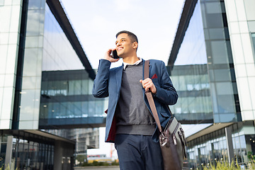 Image showing Phone call, communication or business man walking, networking and talk on 5g conversation in New York. City architecture, employee or happy travel worker, agent or person commuting to office building