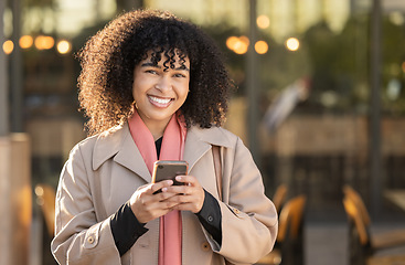 Image showing Travel, portrait or black woman with phone for networking, social media or communication in London street. Search, happy or professional on smartphone for research, internet or blog content outdoor