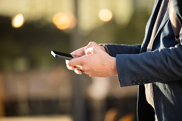 Image showing Hands, networking or business man with phone for travel, social media or communication in London street. Search, zoom or professional on 5g smartphone for research, internet or blog content outdoor