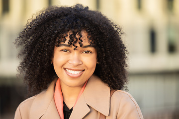 Image showing Black woman, smile portrait and city travel while happy outdoor on London street with freedom. Face of young model person with natural afro hair, beauty and fashion style during a walk on holiday