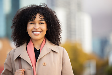 Image showing Black woman, business portrait and city travel with smile outdoor on New york street happy about freedom. Face of young person with natural hair, beauty and fashion on walk with urban buildings space